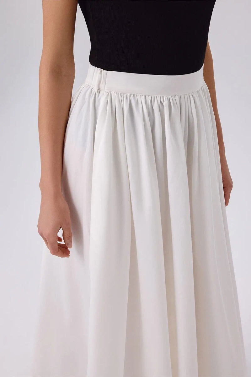 Ekru Cep Detaylı Uzun Kloş Etek
